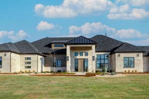 Modern Traditional elevation on 1+ acre lot.